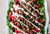 Mediterranean Chicken Shawarma Salad with Garlic Drizzle