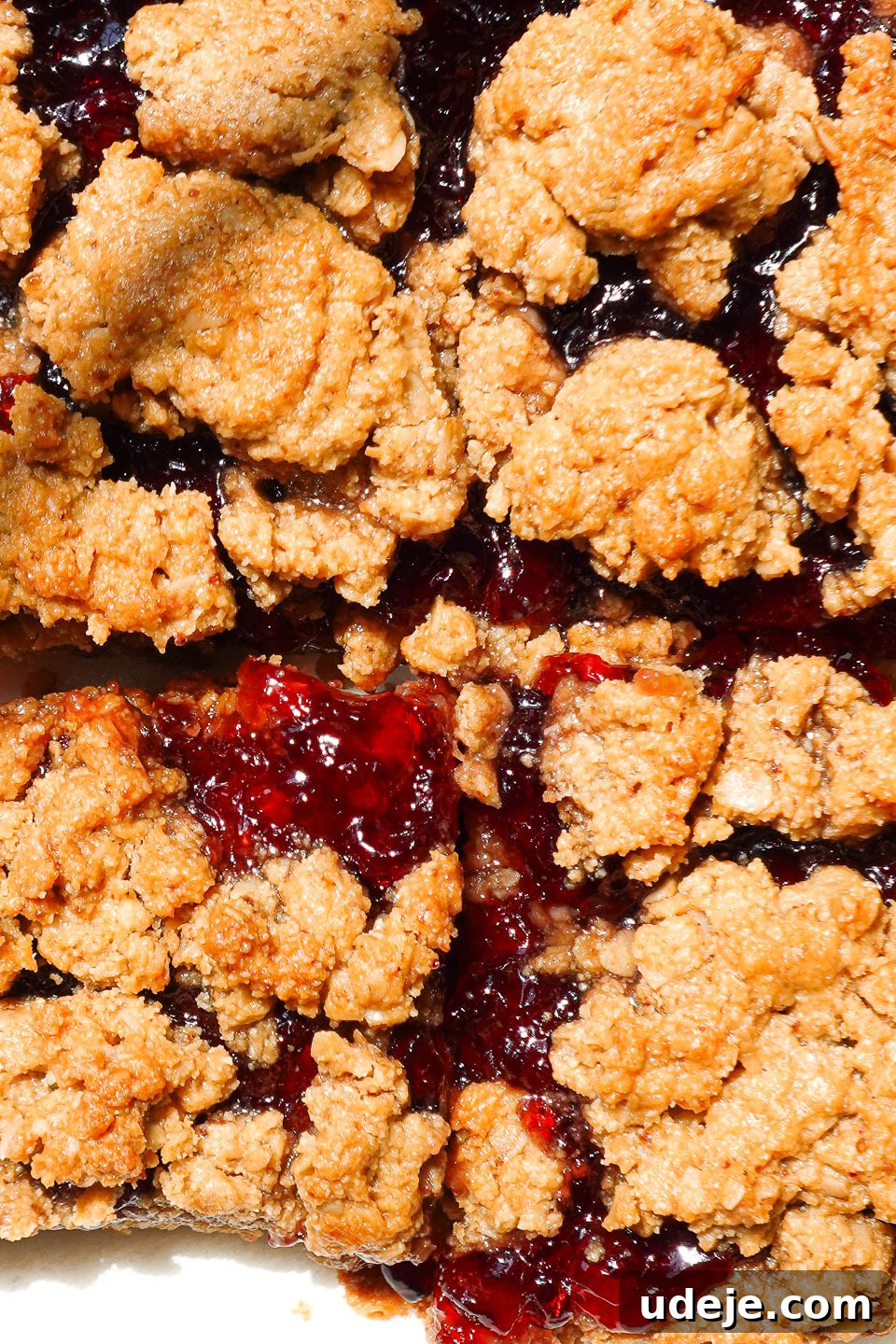 close up of healthy peanut butter and jelly bars, vegan, gluten-free, naturally sweetened