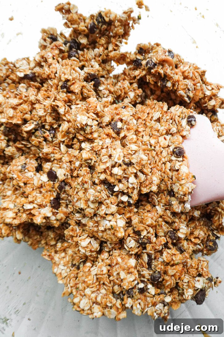 Nourishing Plant-Based Gluten-Free Granola Bars 4 Stirring in wholesome quick oats, fibrous flaxseed, protein-rich hemp seeds, and sweet chocolate chips into the wet peanut butter mixture