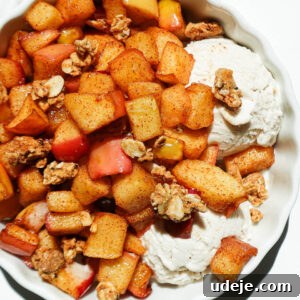Air Fried Cinnamon Apples 11 Easy air fryer apples with maple syrup, cinnamon, and granola in a serving bowl