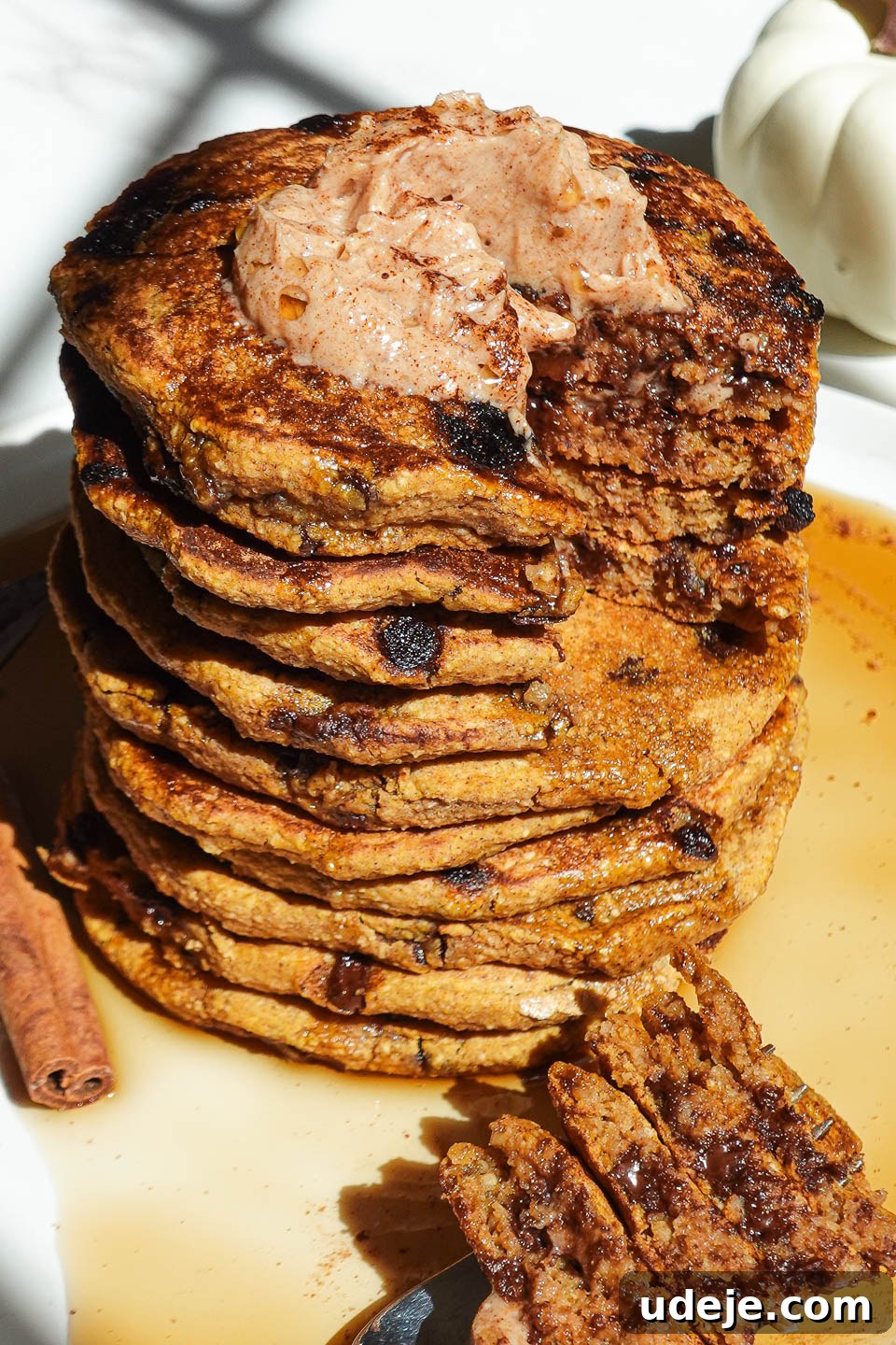 Fluffy Pumpkin Chocolate Chip Pancakes Vegan Gluten-Free 2 Stack of fluffy pumpkin chocolate chip pancakes topped with maple cinnamon butter and drizzled with maple syrup