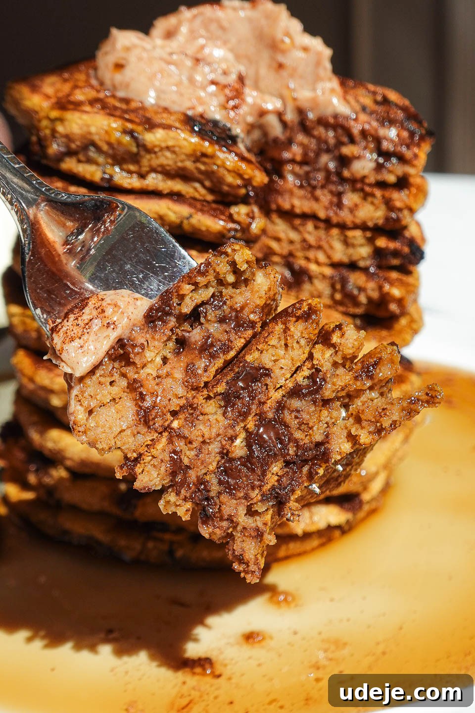 Fluffy Pumpkin Chocolate Chip Pancakes Vegan Gluten-Free 3 Close-up of vegan pumpkin chocolate chip pancakes with melty chocolate chips and maple butter