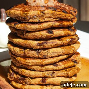 Fluffy Pumpkin Chocolate Chip Pancakes Vegan Gluten-Free 6 Stack of fluffy pumpkin chocolate chip pancakes topped with maple cinnamon butter and drizzled with maple syrup