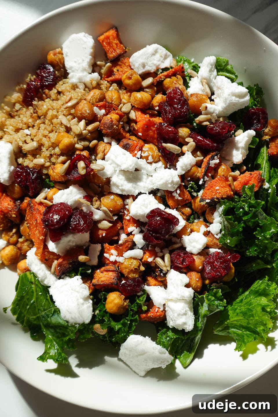 Vibrant Sweet Potato Kale Quinoa Salad 2 kale quinoa salad drizzled with creamy maple tahini dressing