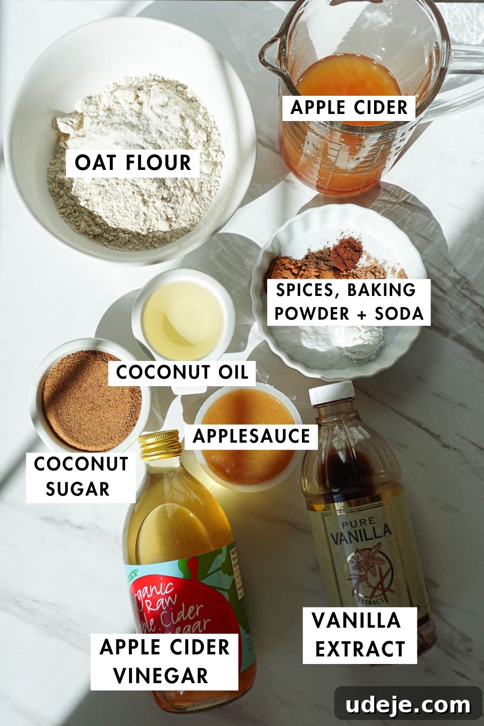 Autumn Spiced Apple Cider Muffins 4 Ingredients for healthy apple cider muffins including oat flour, applesauce, apple cider, coconut sugar, and spices