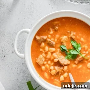Fasolia white bean stew served in a white pot