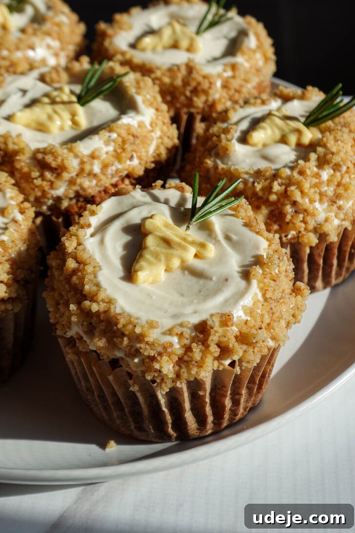 Wholesome Vegan Gluten Free Carrot Cake Muffins 11 Healthy carrot cake muffins with piped carrot frosting decoration