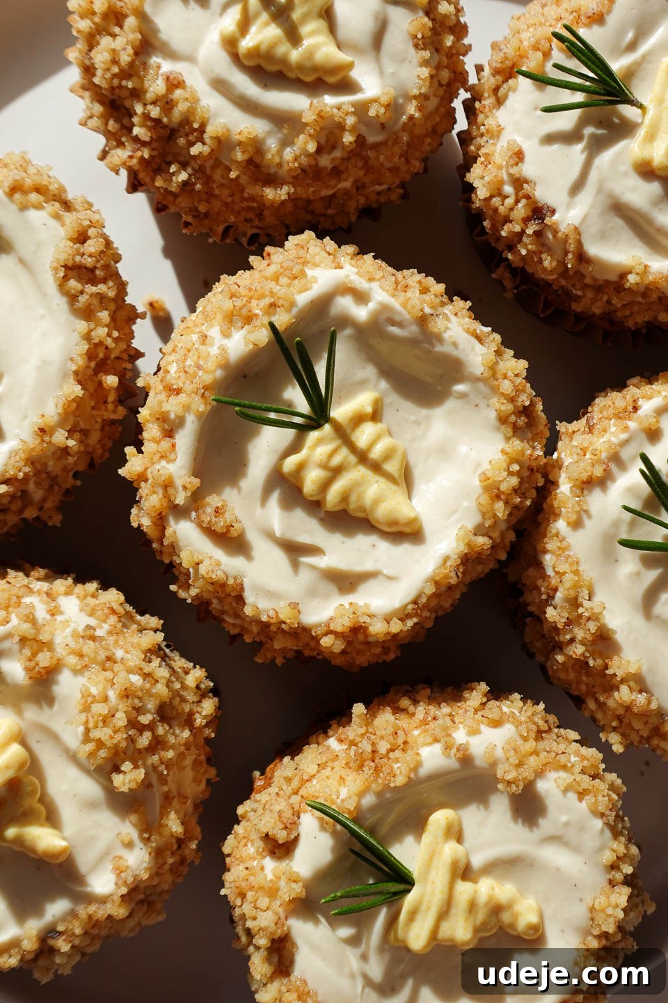 Wholesome Vegan Gluten Free Carrot Cake Muffins 12 cutely decorated healthy carrot cake muffins topped with high-protein vegan cream cheese frosting. gluten-free, too!