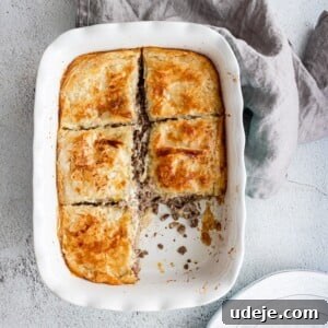 Pharaoh's Flaky Feast 7 Egyptian goulash in a pan with one piece cut out