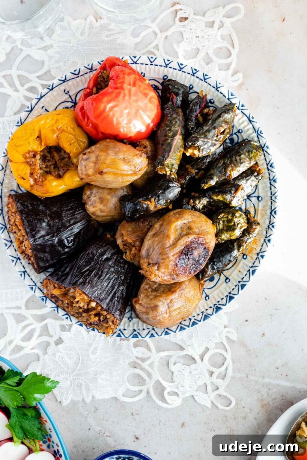 Iraqi Dolma: Stuffed Vegetable Delights 20 Close up of Iraqi dolma which is vegetables stuffed with meat and rice served in patterned blue and white plate