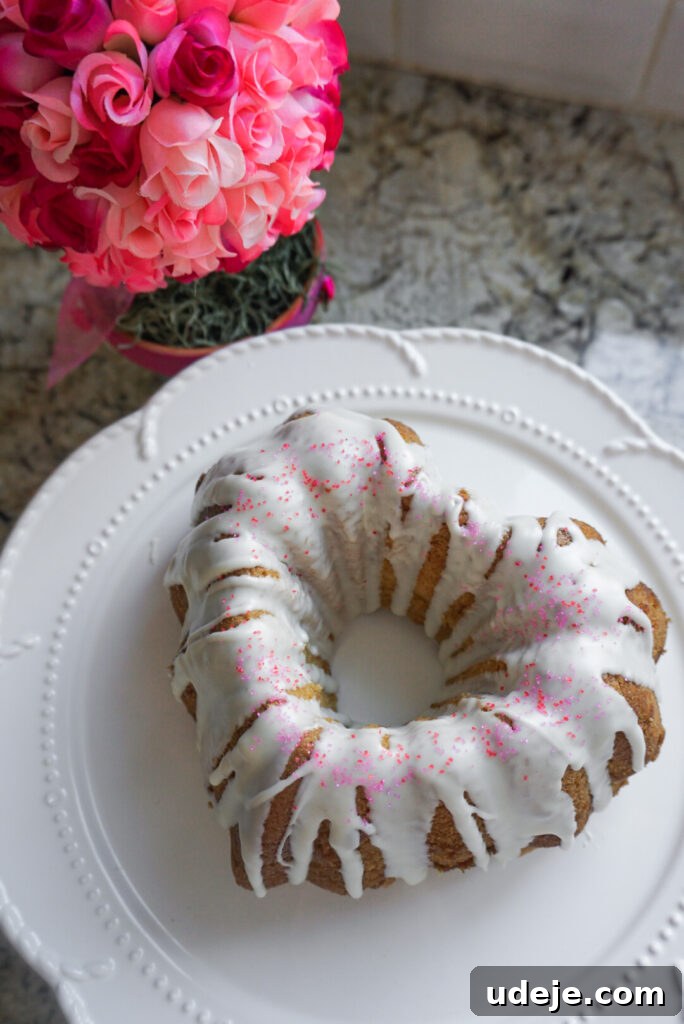 Sublime Vegan Vanilla Bundt 2 Delicious and moist vegan vanilla bundt cake with frosting and sprinkles, perfect for Valentine's Day