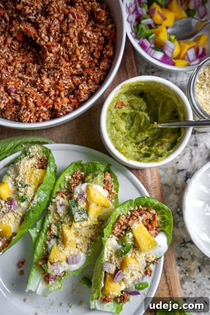 Raw Vegan Tacos are filled with a pecan "meat" and topped with the freshest ingredients that make them burst with flavor!