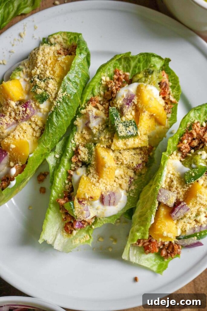 Raw Vegan Tacos are filled with a pecan "meat" and topped with the freshest ingredients that make them burst with flavor!