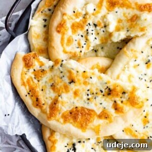 Cheese manakish served on a tray