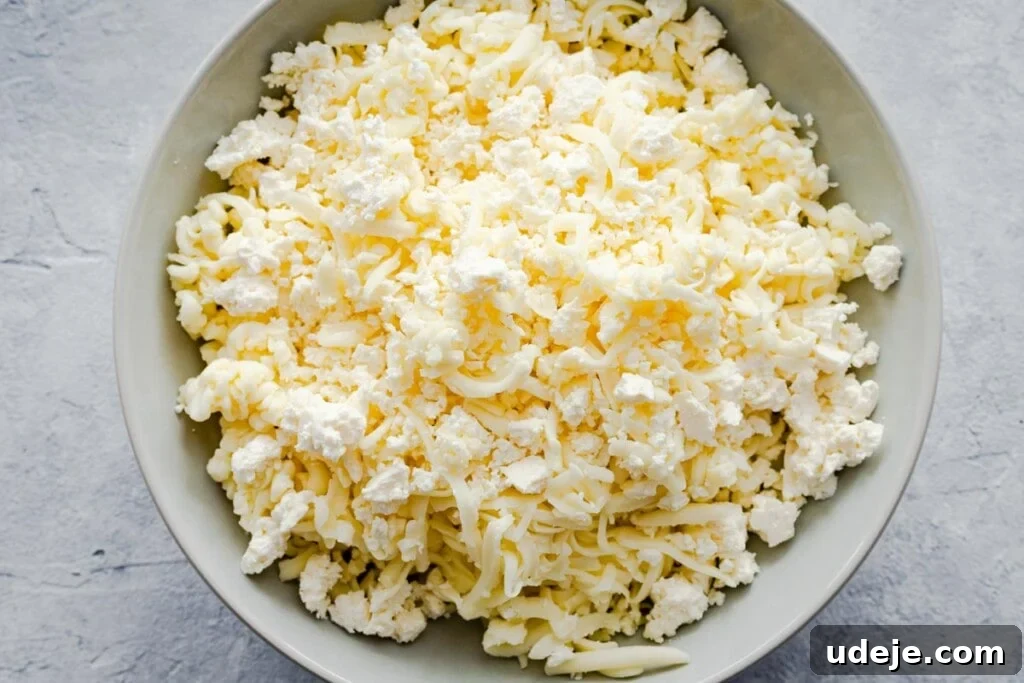 Homemade Cheese and Zaatar Manakish 8 feta cheese mixed with fresh mozzarella, ready for the manakish topping