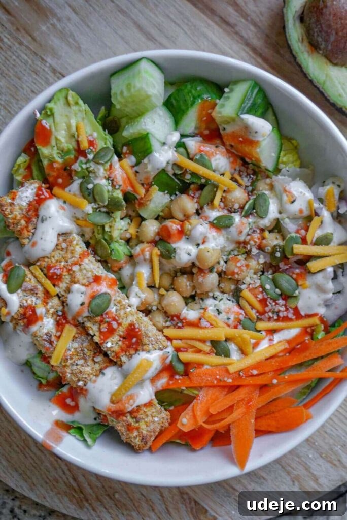 Zesty Tofu Buffalo Salad 3 Close-up of a prepared Buffalo Tofu Salad, highlighting the texture of the crispy tofu and the fresh salad components.