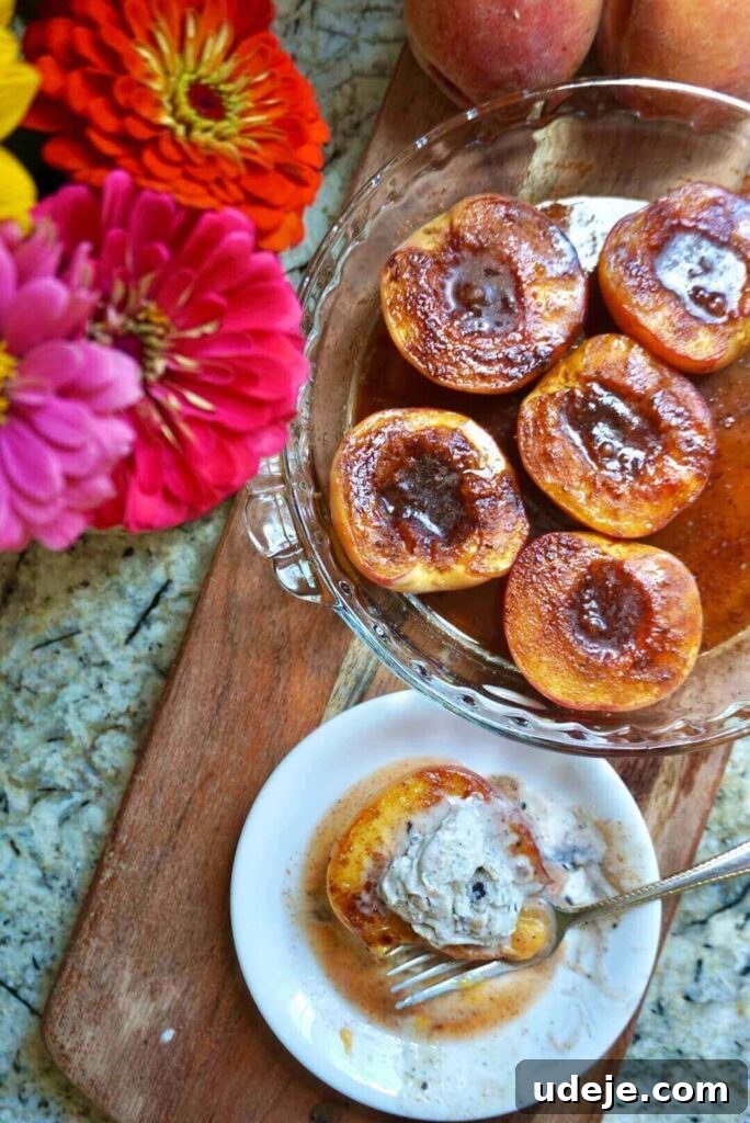Golden Baked Peaches 2 Sweet and juicy baked peaches, topped with creamy vegan ice cream, serving as the perfect healthy summer dessert.