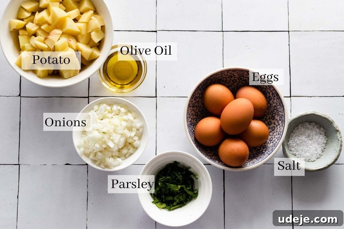 Lazy Sunday Potato Omelette 3 Essential ingredients for a delicious potato omelette: perfectly cubed potatoes, finely diced onions, rich olive oil, fresh parsley, farm-fresh eggs, and seasoned with salt.