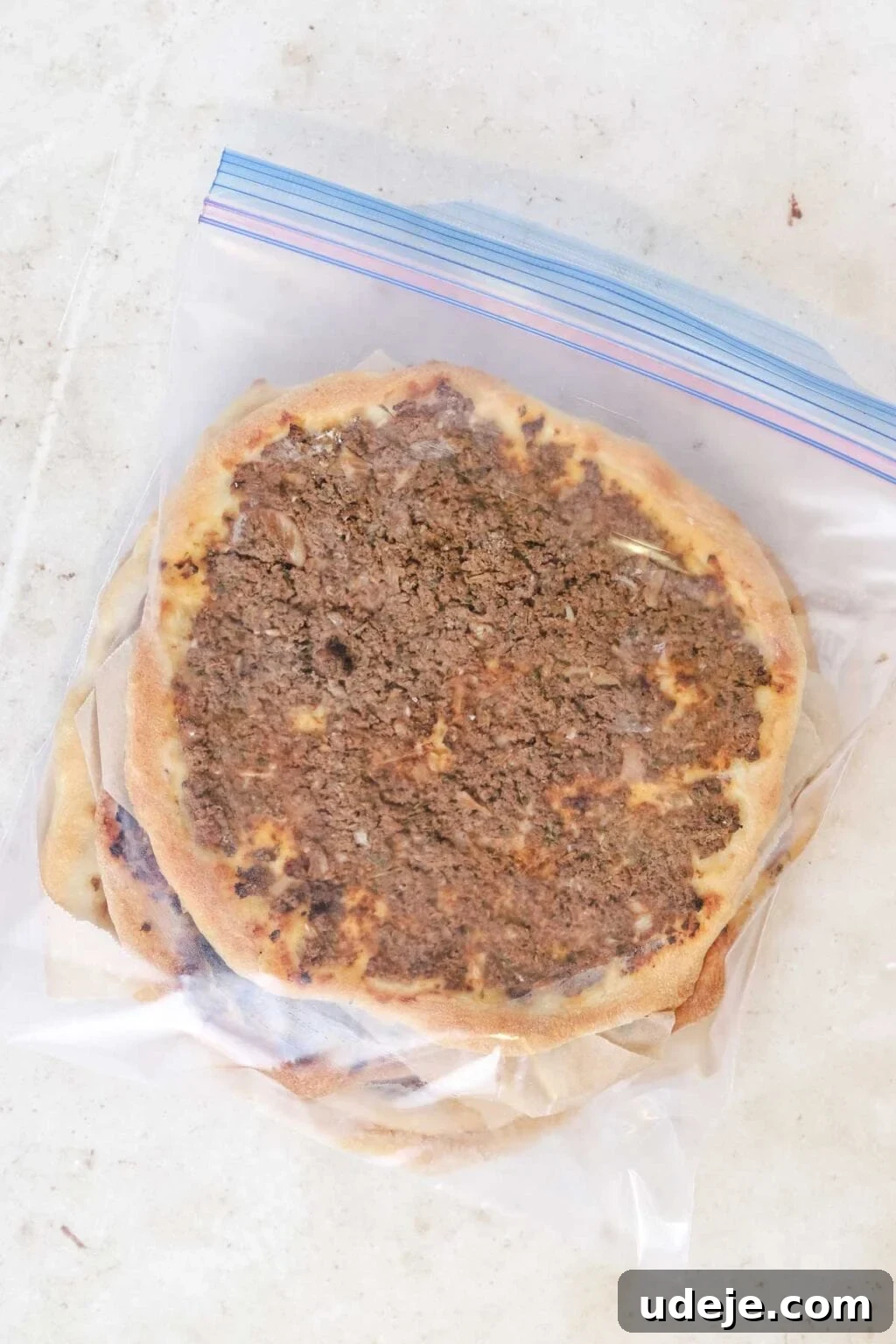 Lahm Bi Ajeen Savory Middle Eastern Flatbread 18 Lahm Bi Ajeen in a ziplock bag on a light coloured background