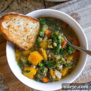 Delicious Butternut Squash, Lentil, and Kale Soup ready to serve.