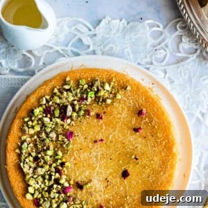 Crispy Kunafa served on a round plate, garnished with pistachios.