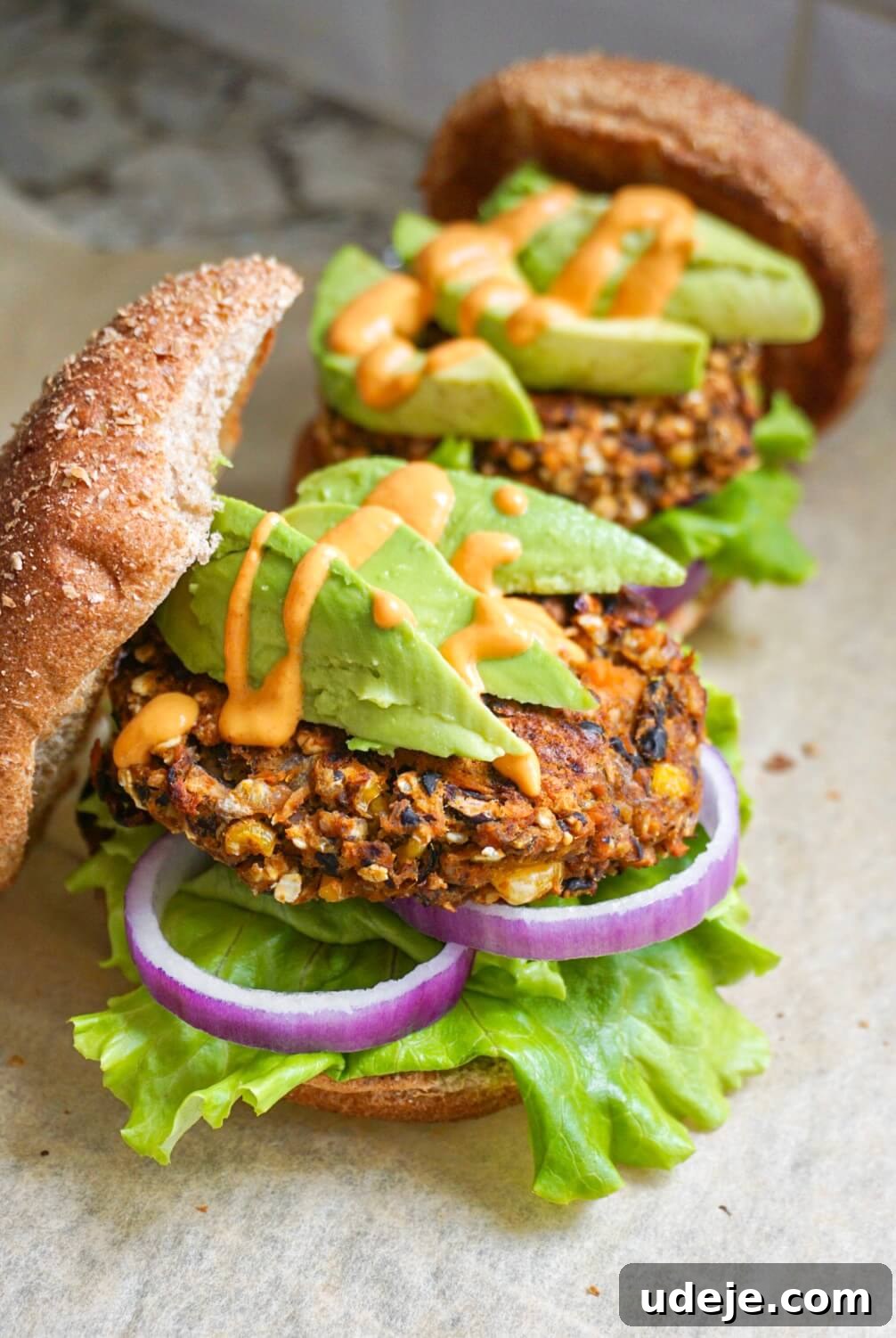 Wholesome Black Bean Sweet Potato Burgers 3 Close-up of a stack of freshly cooked Black Bean and Sweet Potato Veggie Burgers.