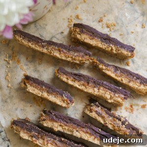 Plant-Based Caramel Cookie Delight 7 Close-up of a Vegan Twix Bar showing layers.