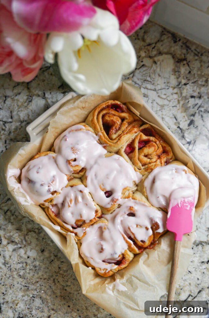 Plant-Based Strawberry Swirls 7 Rolled and cut Vegan Strawberry Rolls ready for baking.