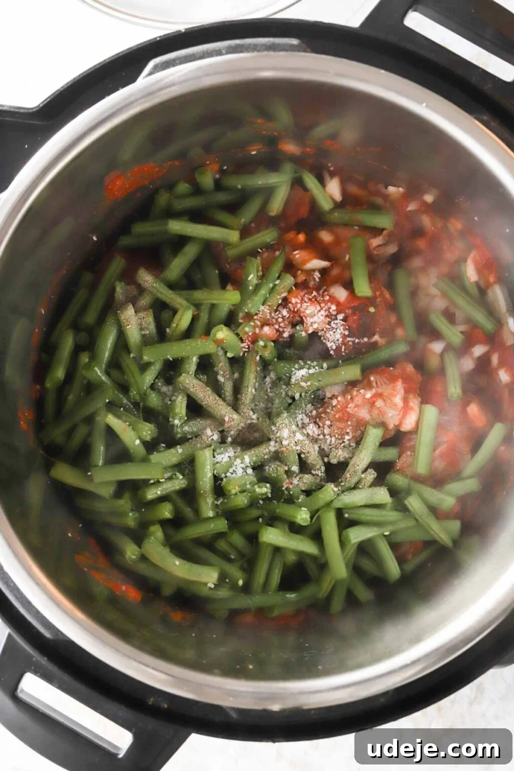 Effortless Green Bean Stew Instant Pot and Stovetop 10 green beans, veal, and onions seasoned with salt and pepper in the Instant Pot