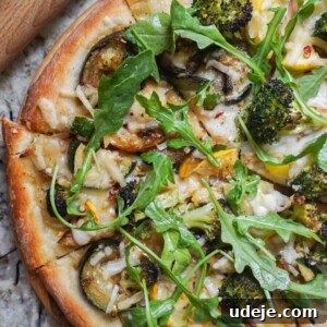 Close-up of a slice of Vegan Summer Squash Pizza