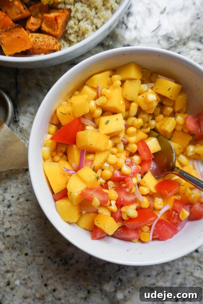 Sweet Potato Sunshine Bowls with Mango Corn Fiesta 4 Close-up of roasted sweet potatoes and seasoned black beans, key components of the nourishing Sweet Potato Burrito Bowls.