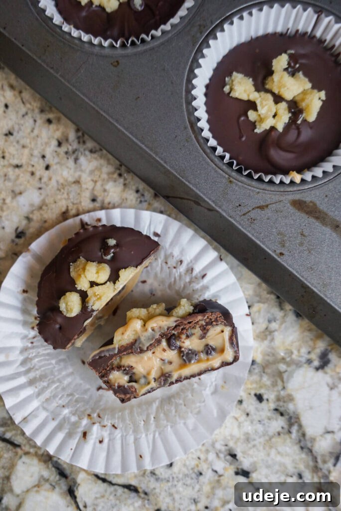 Two finished Vegan Chocolate Chip Cookie Dough Yogurt Cups, highlighting their tempting appearance for a healthy dessert.
