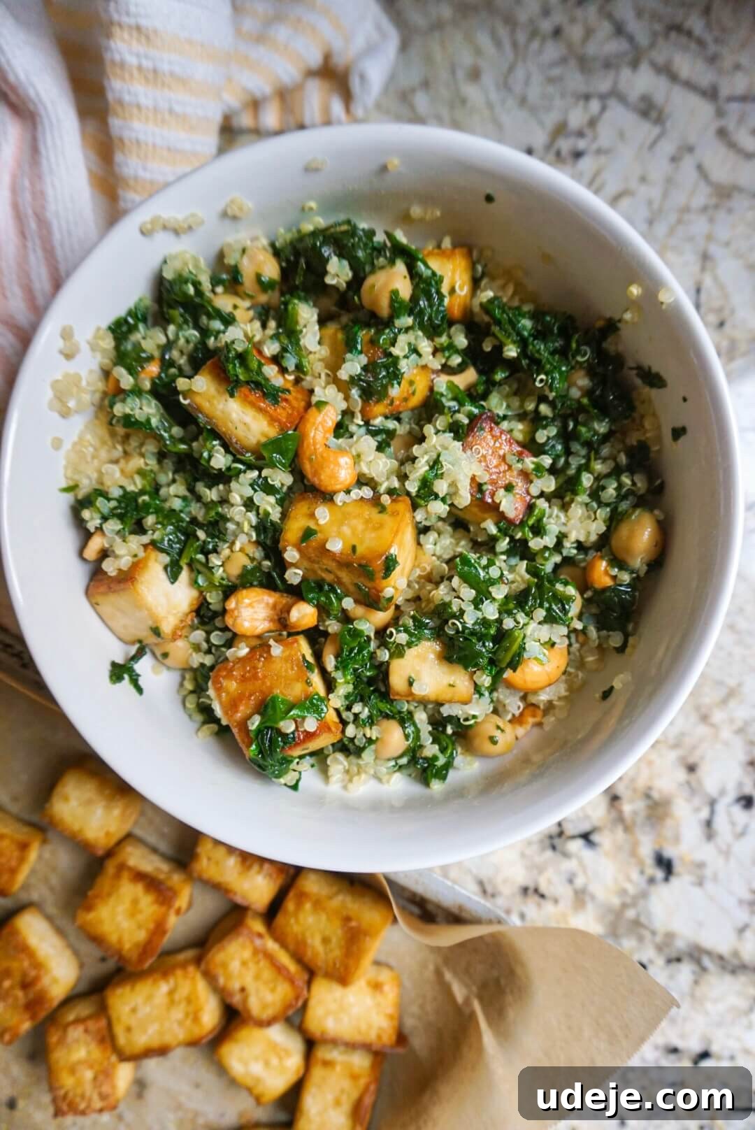 Plant-Powered Tofu, Spinach, and Chickpea Quinoa Bowl 5 This Baked Tofu, Spinach & Chickpea Quinoa Bowl is made with wholesome ingredients making it the perfect option for a satisfying lunch or dinner.