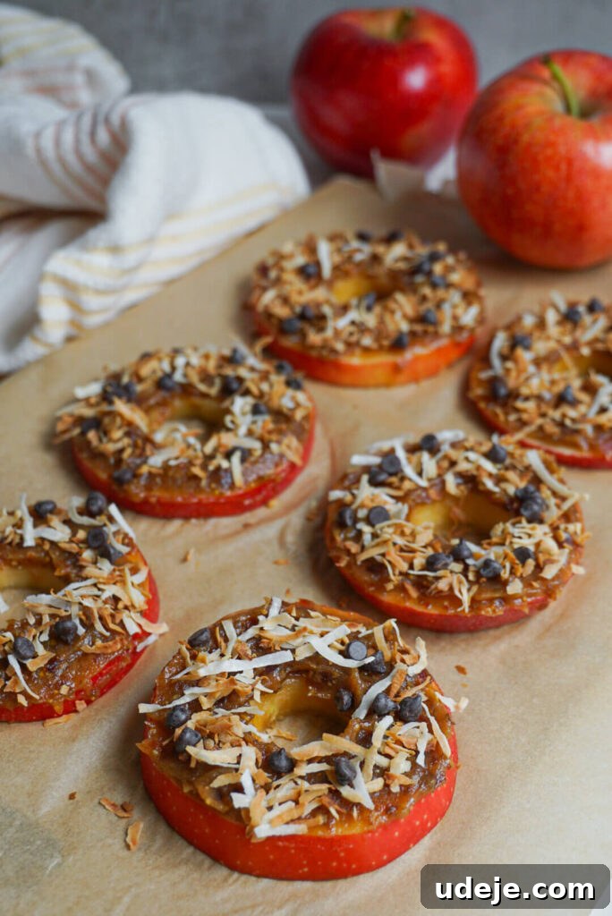 Effortless Caramel Apple Donut Creations 3 No Bake Caramel Apple Donuts are the perfect quick & easy fall treat. Sliced apples topped with a sweet medjool date caramel, toasted coconut flakes and mini chocolate chips.