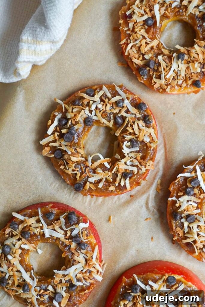 Effortless Caramel Apple Donut Creations 4 No Bake Caramel Apple Donuts are the perfect quick & easy fall treat. Sliced apples topped with a sweet medjool date caramel, toasted coconut flakes and mini chocolate chips.