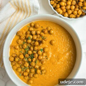 A bowl of Creamy Pumpkin Soup with Crispy Chickpeas