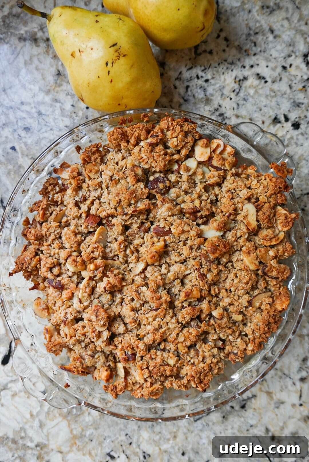 Wholesome Pear Crumble 4 pear crisp in baking dish with pears on the side