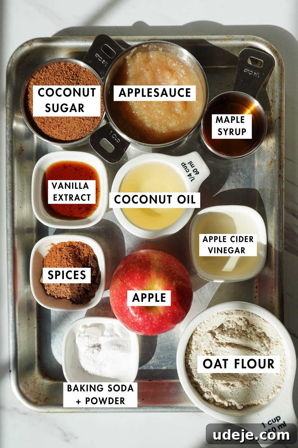 Wholesome Vegan Gluten-Free Apple Bread 5 Collection of healthy apple bread ingredients including oat flour, fresh apples, maple syrup, and aromatic spices