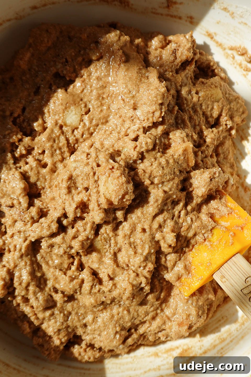 Wholesome Vegan Gluten-Free Apple Bread 7 Close-up of a bowl showing the apple bread batter being mixed to perfection