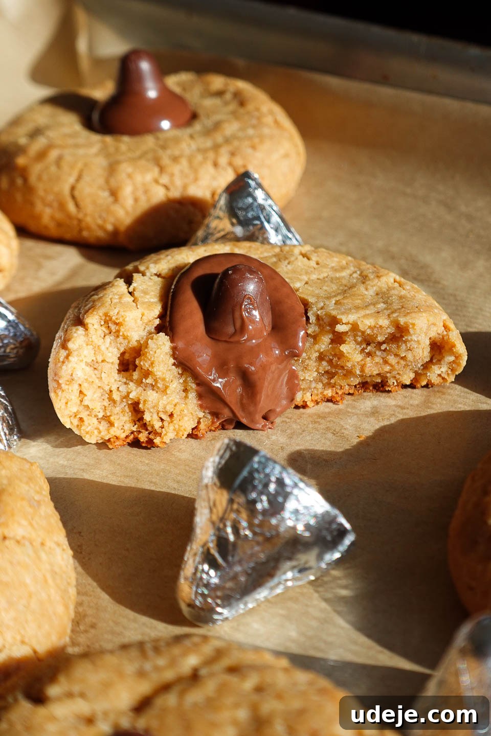 Healthy Vegan Gluten-Free Peanut Butter Blossoms 6 soft and chewy peanut butter blossoms with bite taken out