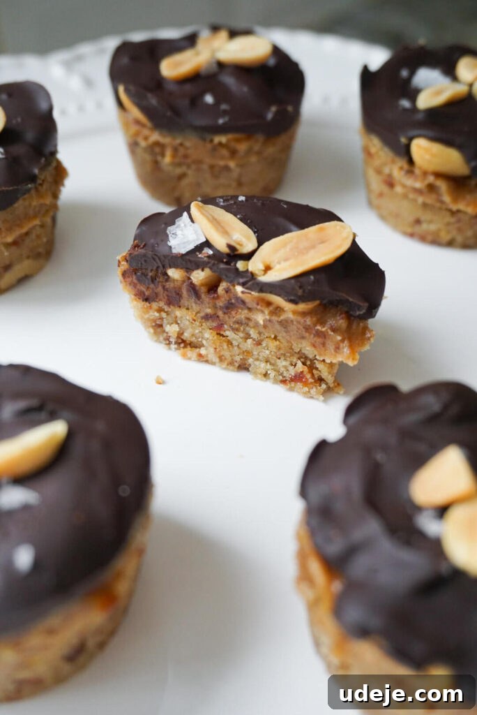 Easy Plant-Based Chocolate Peanut Caramel Cups 2 Snickers in cup form! No baking is required to make these healthier Snickers Cups that are vegan, gluten free, refined sugar free and so delicious.