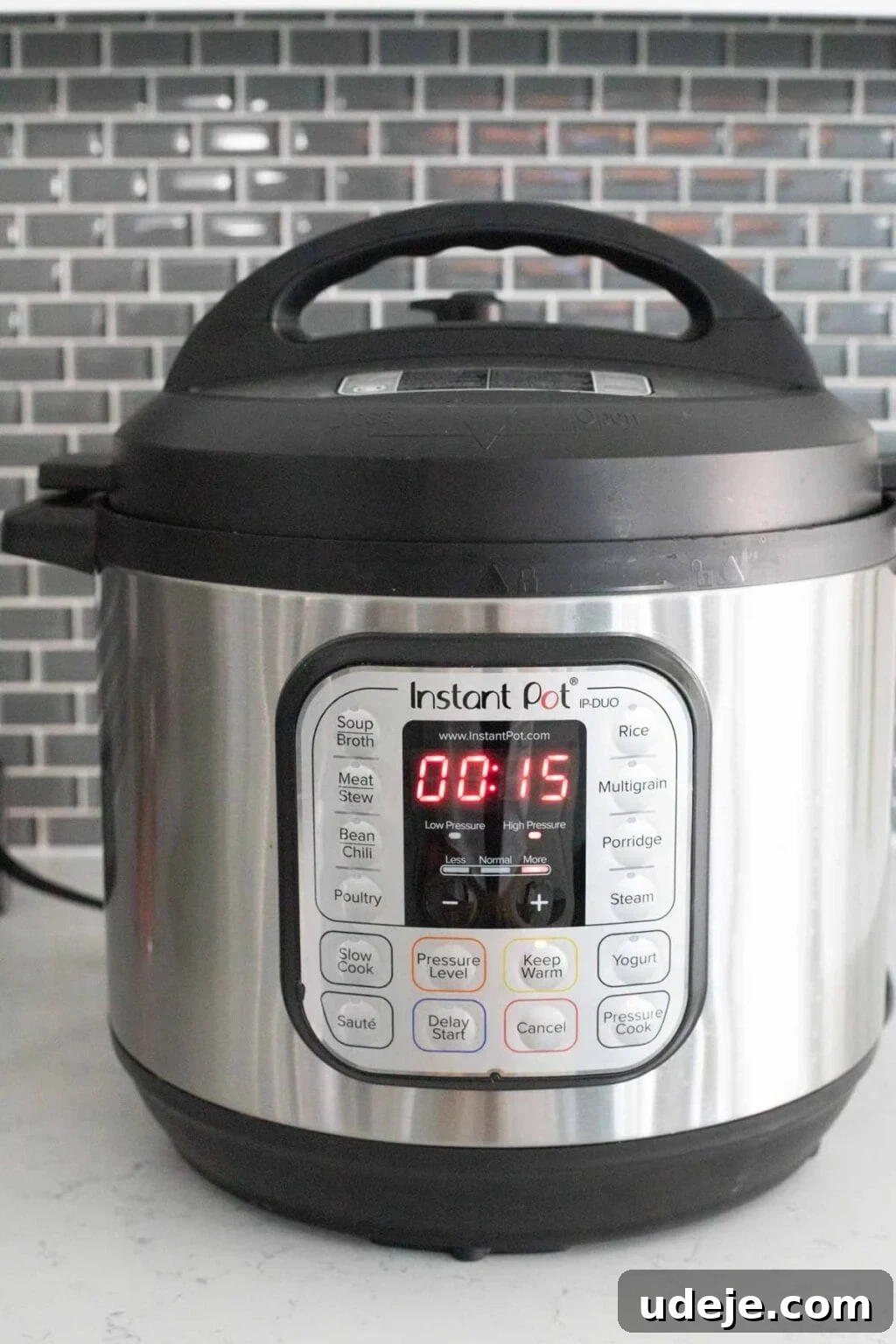 Chef's Signature Lamb Kabsa 9 Image of an instant pot showing 15 minutes on the display