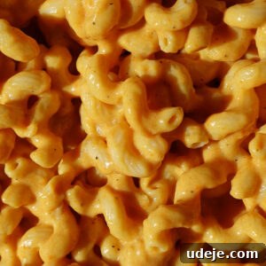 Close up of creamy hidden veggie vegan mac and cheese made with potatoes and carrots