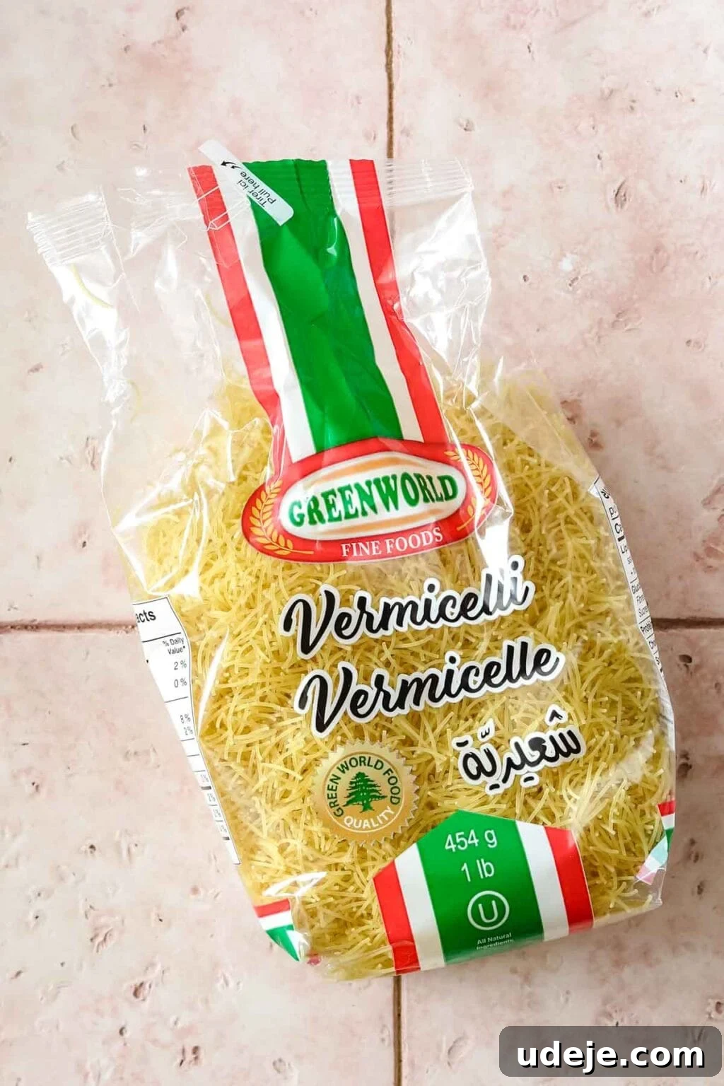 Egyptian Cloud Rice 4 Pack of vermicelli noodles on a pink tiled background