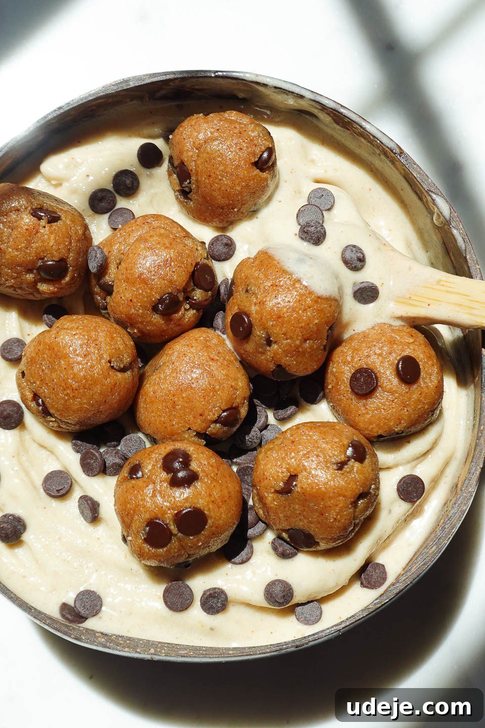 Wholesome Vegan Cookie Dough Bliss 3 Creamy texture of banana nice cream with chunks of edible cookie dough throughout