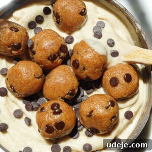 Creamy texture of banana nice cream with chunks of edible cookie dough throughout