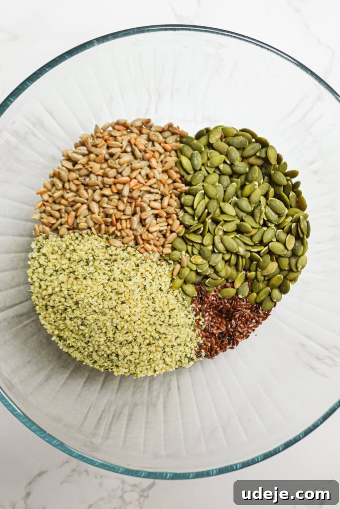 Simple Flaxseed Crisps 4 Close-up of the mixed flax, sunflower, pumpkin, and hemp seeds in a bowl with water, gelling.