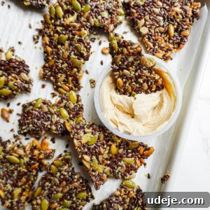 Simple Flaxseed Crisps 8 Easy Flax Seed Crackers on a baking sheet