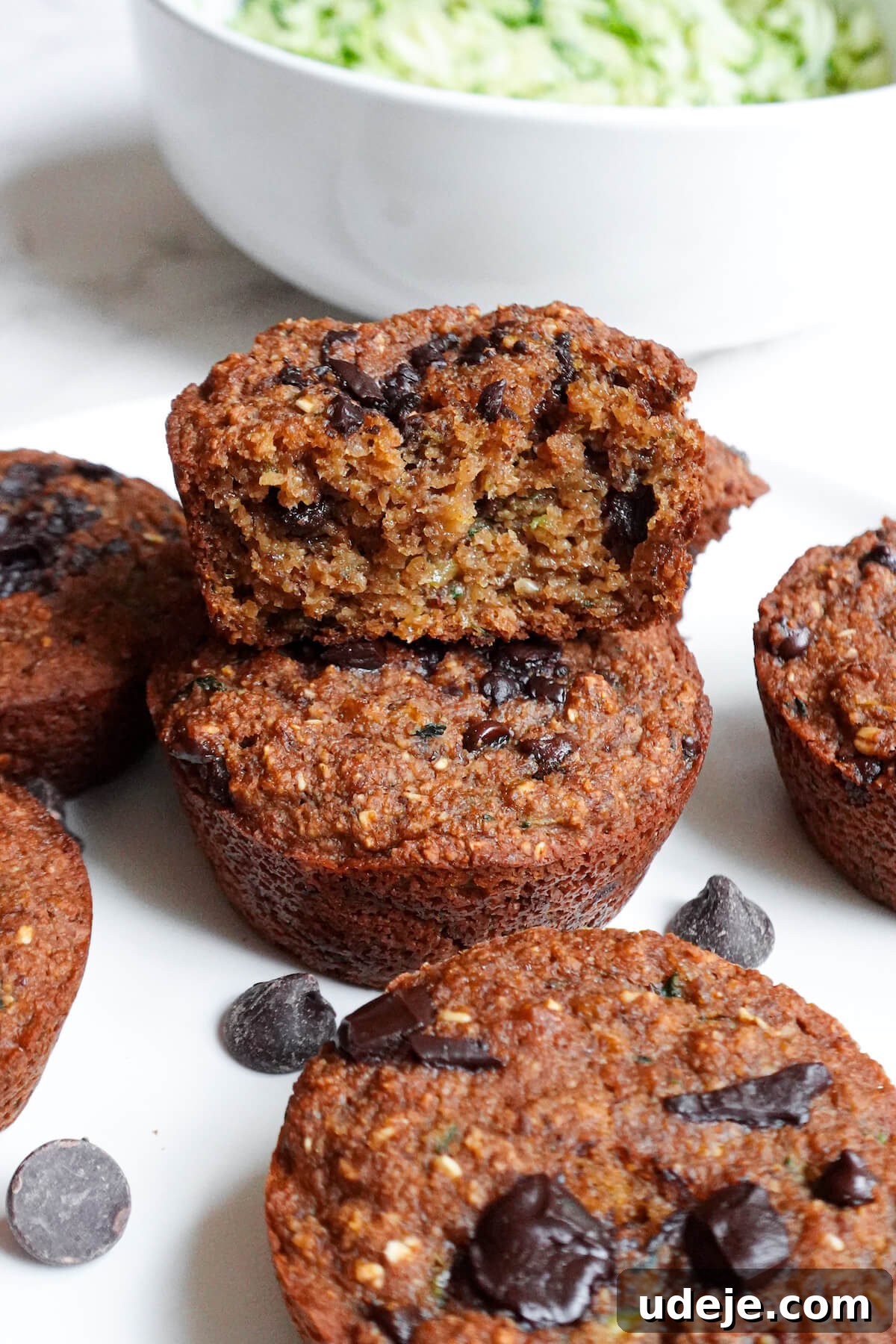 Perfectly Healthy Zucchini Muffins Vegan Gluten Free 3 Moist and fluffy zucchini muffins cut in half to show texture