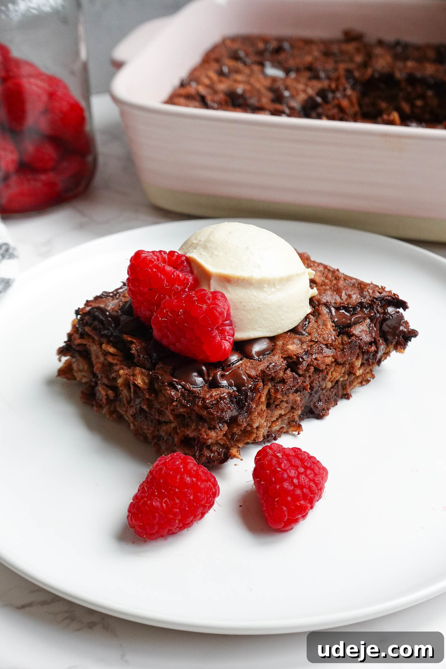Decadent Chocolate Baked Oats 2 Delicious and wholesome Brownie Baked Oatmeal, perfect for a vegan and gluten-free breakfast, naturally sweetened with maple syrup.